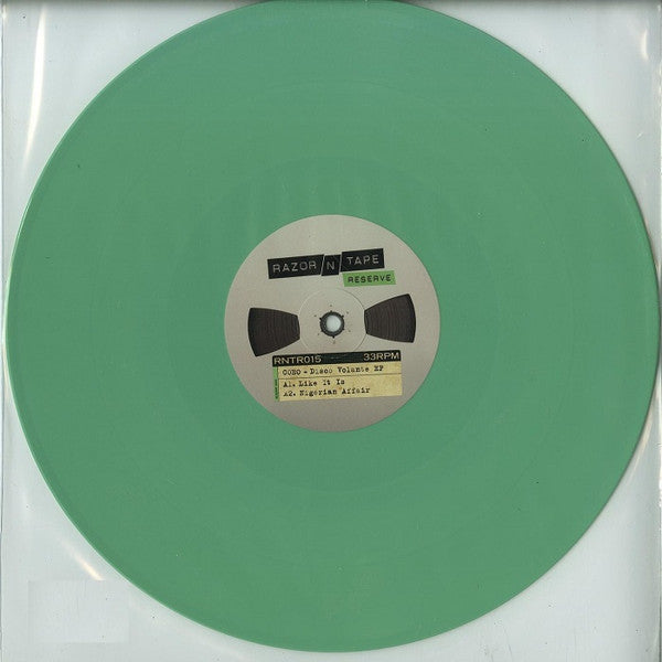 Vinilo 12" verde del Disco Volante EP de COEO publicado por Razor-N-Tape Reserve. Texto impreso: lado A – listado de temas y sello.