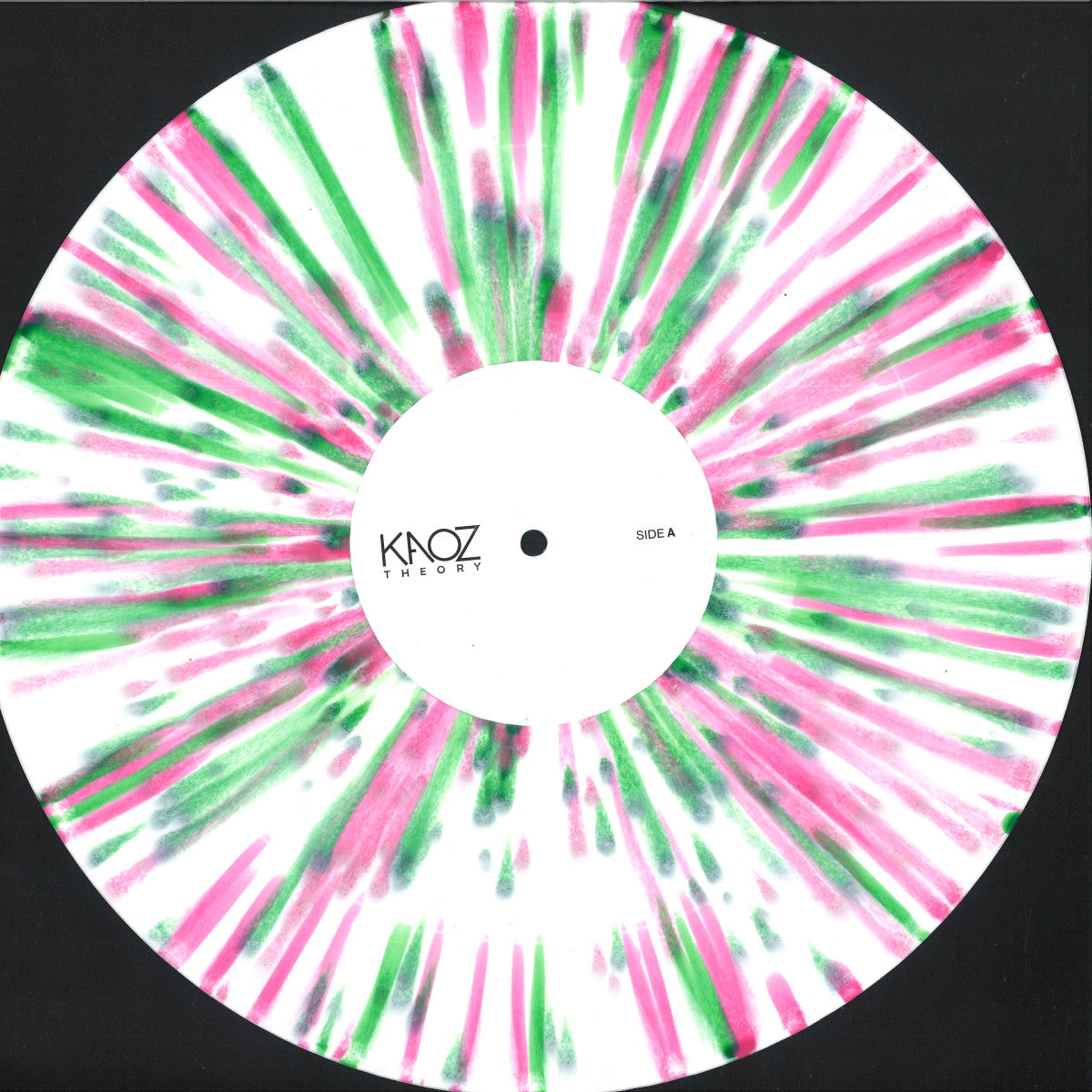 Vinilo 12" salpicado blanco con diseño radial rosa y verde del disco Kerri Chandler Feat. Nae (SA) – Caged Bird, lado A sin créditos visibles.