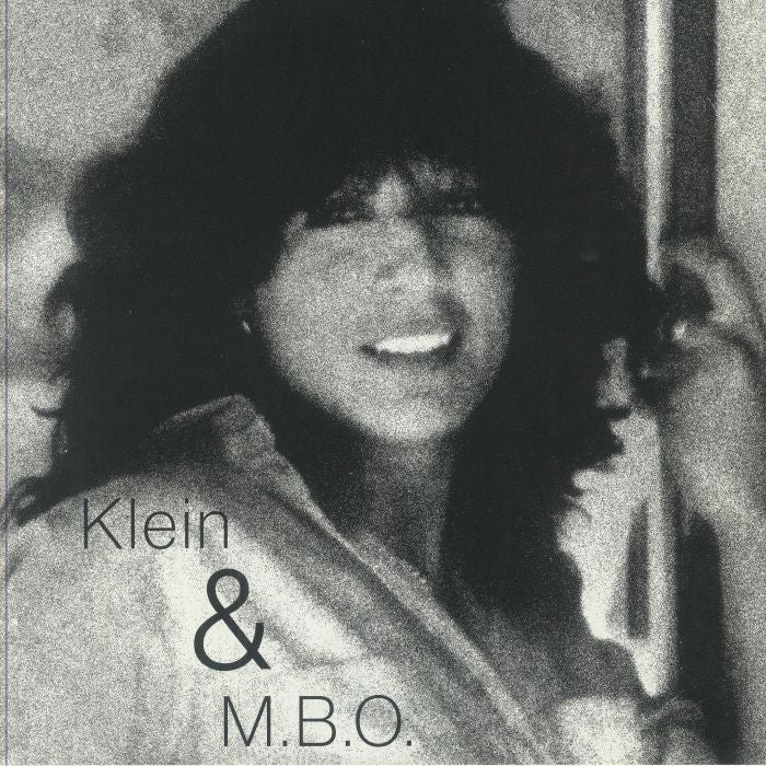 Portada delantera del vinilo "Klein & M.B.O. - Dirty Talk" (Discoring Records, 12" blanco). Diseño en blanco y negro con retrato en primer plano.