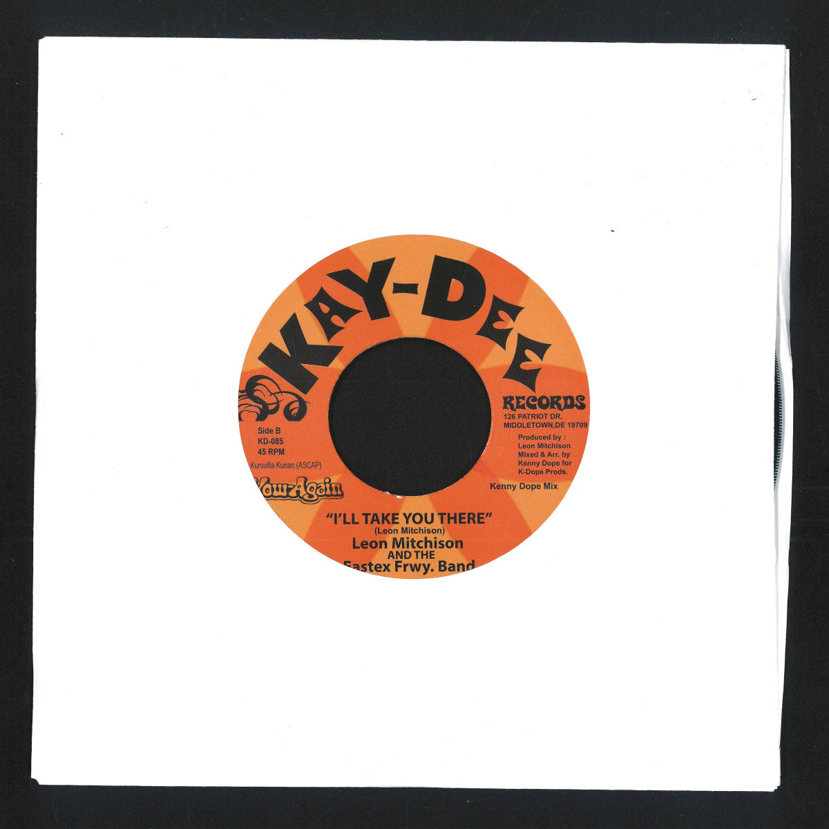 Etiqueta del lado B del vinilo 7" de Leon Mitchison & the Eastex Freeway Band – What Cha Need / I'll Take You There, con título “I’ll Take You There” y estética clásica de Kay-Dee Records sobre funda blanca.