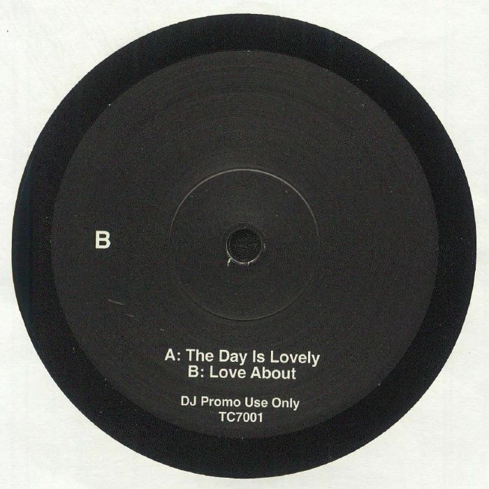 Etiqueta central lado B del vinilo LNTG – The Day Is Lovely / Love About en formato 7" promo, con pistas The Day Is Lovely y Love About, uso exclusivo DJ, catálogo TC7001.
