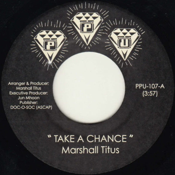 Etiqueta del lado A del vinilo Marshall Titus - Take A Chance On The Feeling. Incluye el tema “Take A Chance” con créditos a Marshall Titus y Jun Mhoon.
