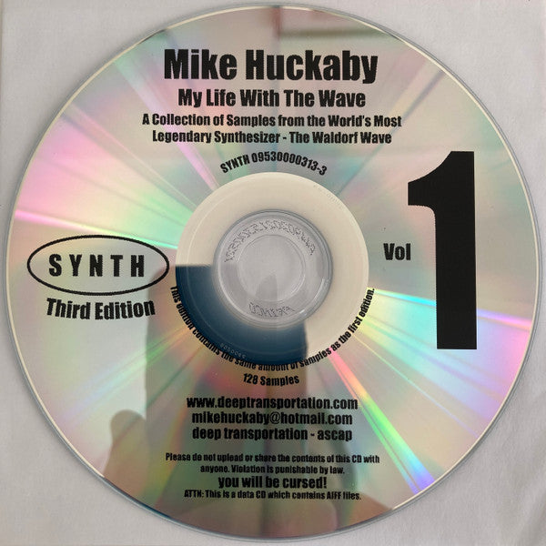 CDr sampler de "Mike Huckaby – My Life With The Wave 1" (CDr, sello S Y N T H), con el texto "Vol 1" y detalles del contenido de samples.