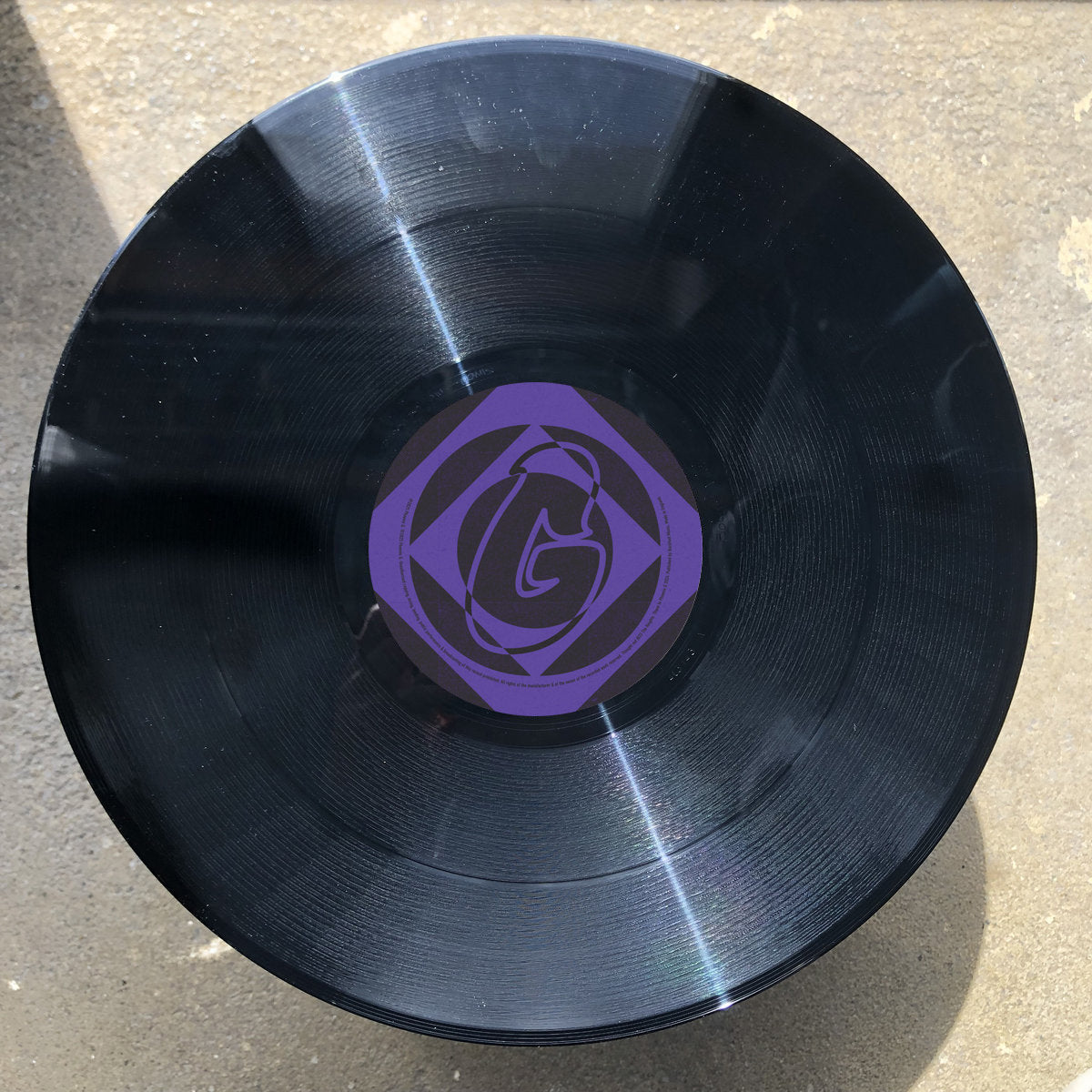 Cara B del vinilo Mr. G – RSD 2025 The Lost Tracks Vol. 1 con etiqueta artística morada y diseño distintivo del sello Phoenix G.