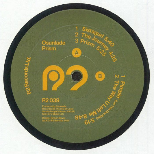 Portada trasera del vinilo Osunlade – Prism, publicado por R2 Records en 12". Contiene la lista de canciones, créditos y sello discográfico.
