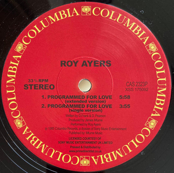 Etiqueta central del lado A del vinilo 12" de Roy Ayers – Programmed For Love (Columbia); muestra dos versiones del tema con créditos, duración y número de catálogo.