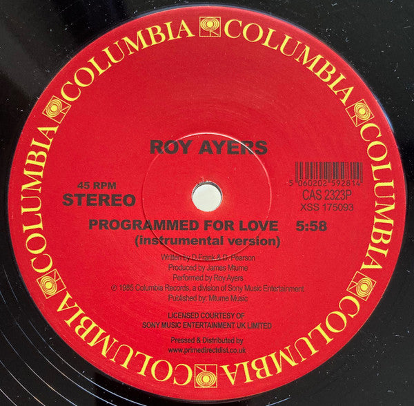 Etiqueta central del lado B del vinilo 12" de Roy Ayers – Programmed For Love (Columbia); presenta la versión instrumental con detalles visibles de producción y diseño en rojo vibrante.