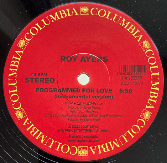 Etiqueta central del lado B del vinilo 12" de Roy Ayers – Programmed For Love (Columbia); presenta la versión instrumental con detalles visibles de producción y diseño en rojo vibrante.