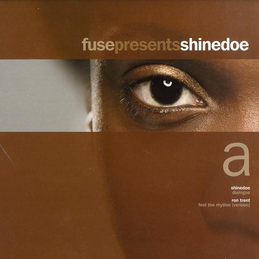 Portada delantera del vinilo, con una imagen artística de un ojo y el nombre del artista "Shinedoe". El vinilo (Shinedoe – Fuse Presents Shinedoe (Sampler 1), Music Man Record, 12") presenta el tema "Dialogue".