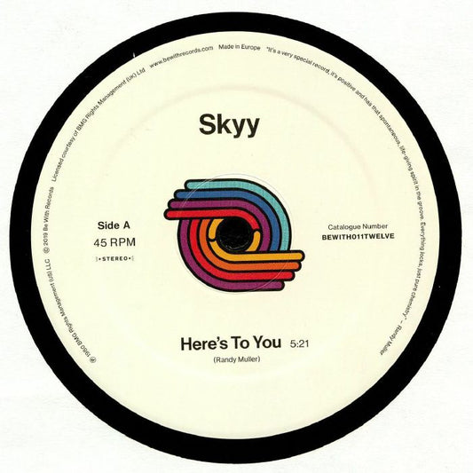 Portada delantera del vinilo Skyy - "Here’s To You / You Got Me Up" lanzado por Be With Records en formato 12". Texto impreso: "Skyy", "Here’s To You", duración 5:21, catálogo BEWITH011TWELVE.