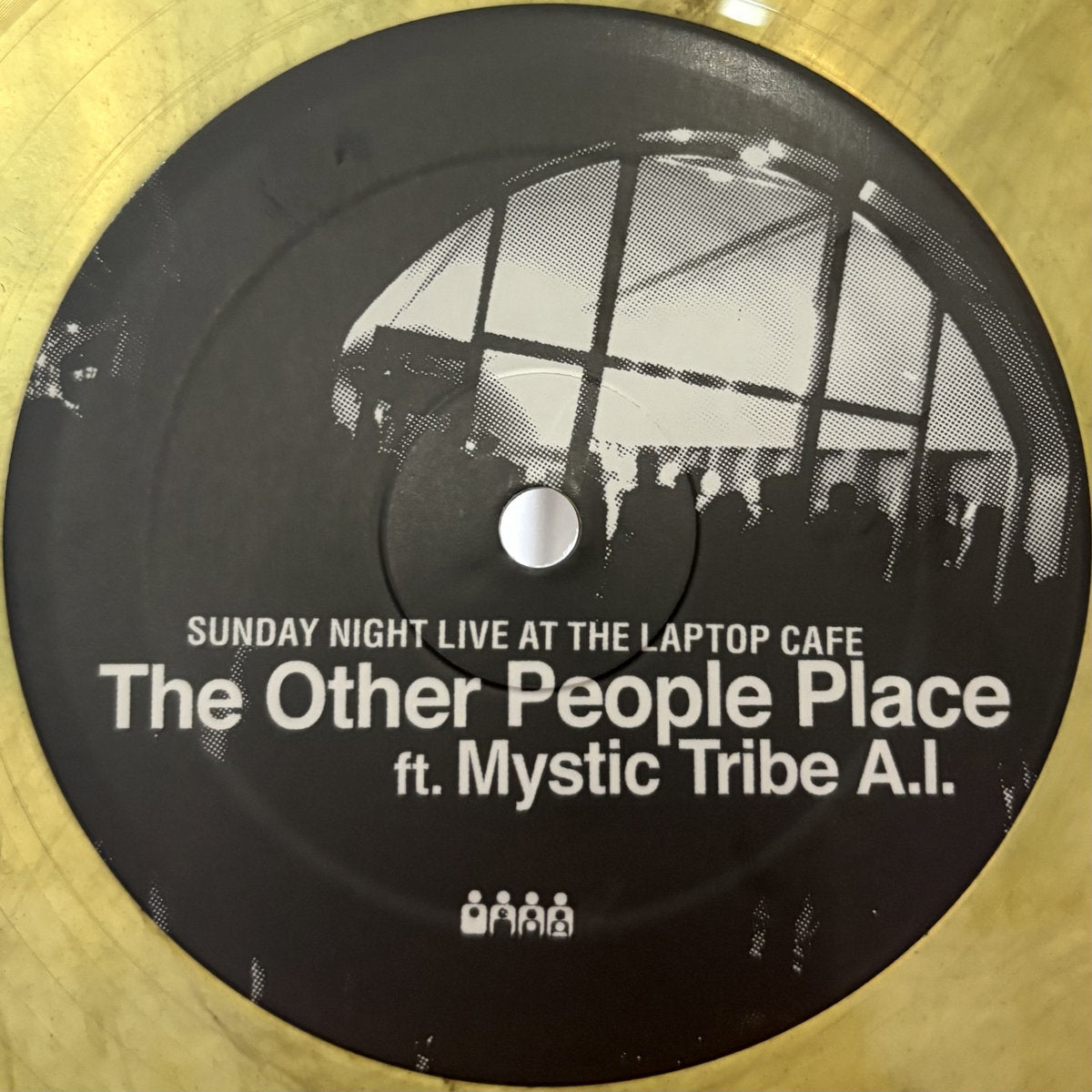 Vinilo 12" en edición mármol café/negro de The Other People Place – Sunday Night Live At The Laptop Cafe, Clone Aqualung Series. Texto impreso: título completo y colaboración con Mystic Tribe A.I.
