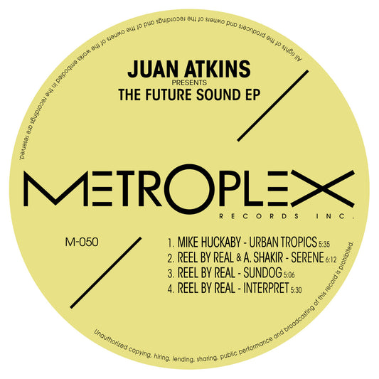 Gracias por la corrección. Aquí tienes el texto alternativo actualizado:
Etiqueta central del vinilo Varios Artistas – Juan Atkins Presents The Future Sound EP en formato 12", reedición del sello Metroplex; muestra las 4 pistas completas con duración, créditos a Mike Huckaby, Reel By Real, y Anthony Shakir, además del catálogo M-050.