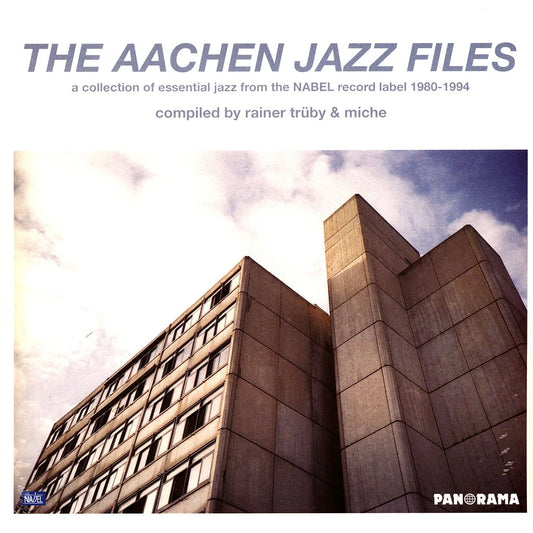 Portada del vinilo Varios Artistas – The Aachen Jazz Files en Panorama, con edificio moderno bajo cielo nublado.