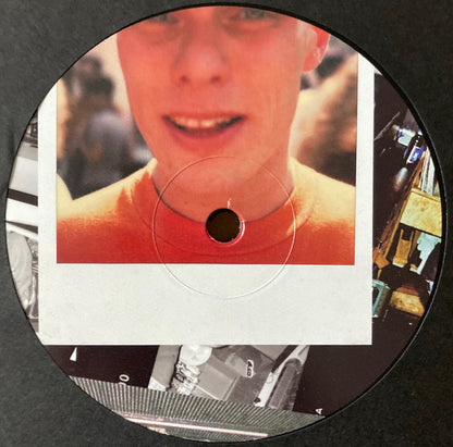 Lado C de vinilo Ata & nd_baumecker – Running Back Mastermix Presents Wild Pitch Club Part I/II con label rojo, listado de pistas C1 a D2 y detalles de edición.