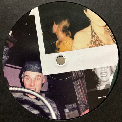Lado A de vinilo Ata & nd_baumecker – Running Back Mastermix Presents Wild Pitch Club Part II/II con label azul, tracks A1 a B3 impresos y logo Running Back.