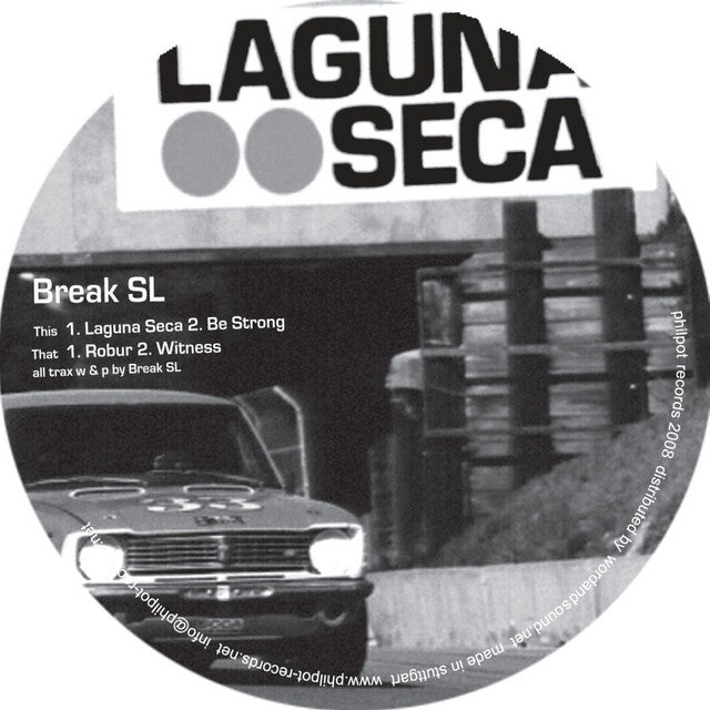 Lado A del vinilo Break SL – Laguna Seca, etiqueta Philpot en blanco y negro con auto, título y pistas A1–A2-B1-B2.