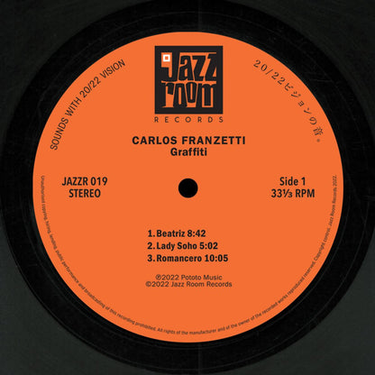 Lado A del vinilo Carlos Franzetti – Graffiti, con etiqueta naranja, catálogo JAZZR 019 y tres pistas impresas.
