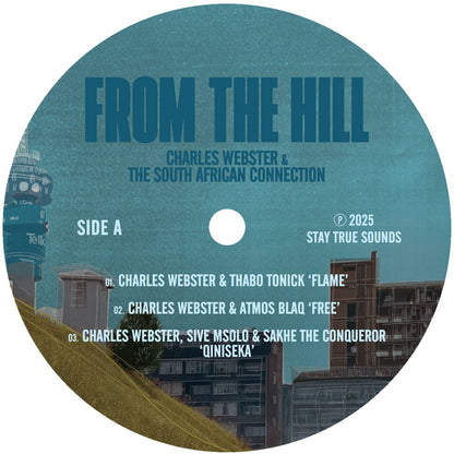 Etiqueta central lado A del vinilo Charles Webster & The South African Connection – From The Hill con listado de 3 pistas y créditos básicos, diseño circular sobre fondo urbano, Stay True Sounds.