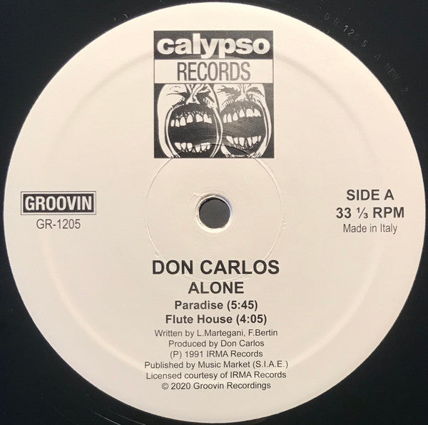 Lado A del vinilo Don Carlos – Alone; etiqueta blanca con “Paradise”, “Flute House”, catálogo GR-1205 y 33⅓ RPM.