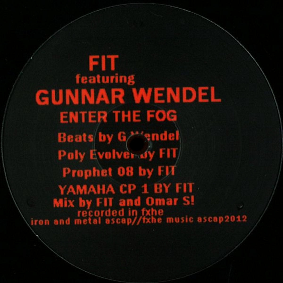 Lado A del vinilo FIT Feat. Gunnar Wendel – Enter The Fog, etiqueta negra con créditos de Gunnar Wendel y FIT, FXHE Records.