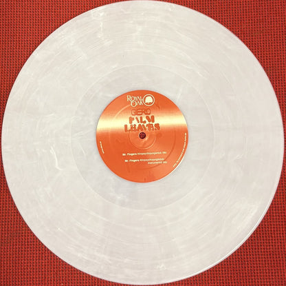 Portada del vinilo Gerd – Palm Leaves Remixes 12" Blanco Nieve en Royal Oak, etiqueta naranja con logo y mixes de Mr. Fingers visibles en el centro.