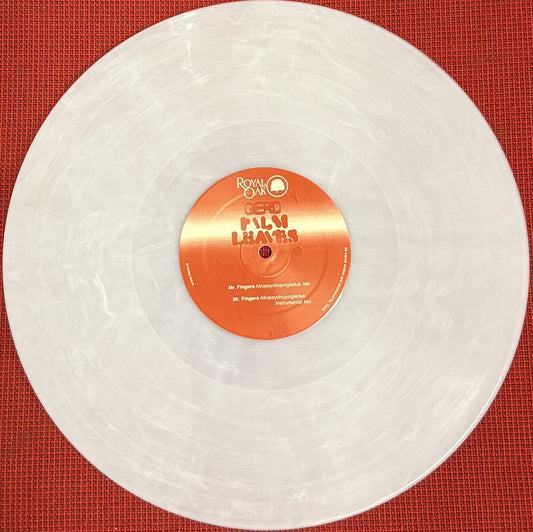 Portada del vinilo Gerd – Palm Leaves Remixes 12" Blanco Nieve en Royal Oak, etiqueta naranja con logo y mixes de Mr. Fingers visibles en el centro.