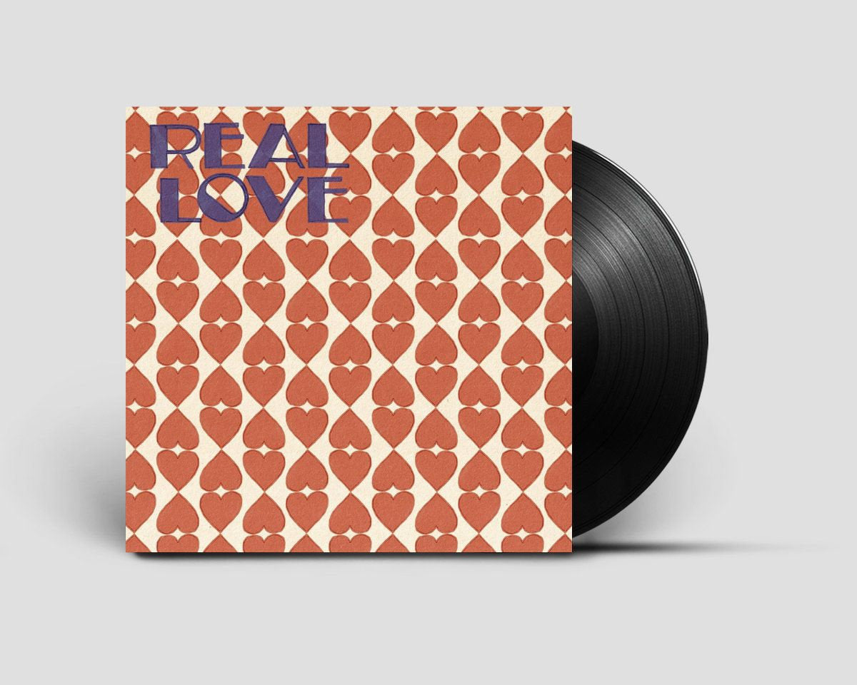 Vinilo 12" Jerk Boy & Marcel Vogel feat. Million Miles – Real Love en Lumberjacks In Hell, mostrando portada con corazones rojos y el disco parcialmente fuera de la funda.