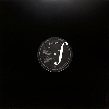 Contraportada del vinilo Jimi Tenor – Release Me! en 12" por Fluid Ounce, funda negra con orificio central que deja ver la etiqueta del lado B.