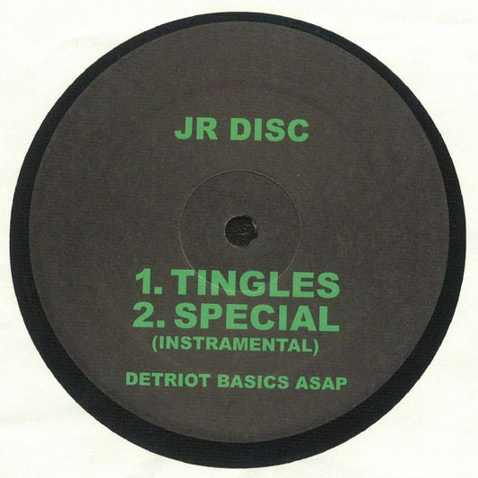 Portada delantera del vinilo JR Disc – Thrust publicado por Detroit Basics en formato 12". Incluye la lista de canciones del lado A con "Tingles" y "Special (Instrumental)". Texto impreso: "JR Disc", "Detroit Basics ASAP".