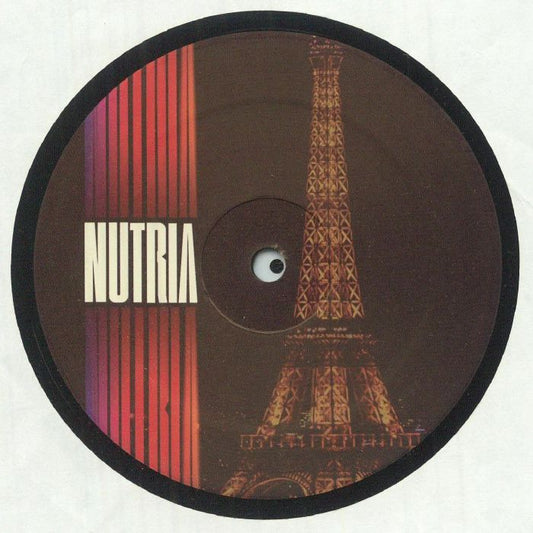 Etiqueta del lado B del vinilo Marcelo Cruz – Mi Espiritu EP en Nutria Sounds, con fotografía nocturna de la Torre Eiffel iluminada y diseño gráfico de tonos cálidos sobre fondo oscuro.