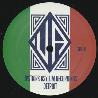 Lado A de vinilo Miguel Herrnandez / Manuold – D-Ritmo 313 EP con etiqueta tricolor, logo central y texto Upstairs Asylum Recordings Detroit visible.