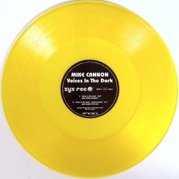 Vinilo amarillo del disco Mike Cannon – Voices In The Dark de ZYX Music, lado A con etiqueta negra que muestra títulos, duraciones y créditos de las pistas.