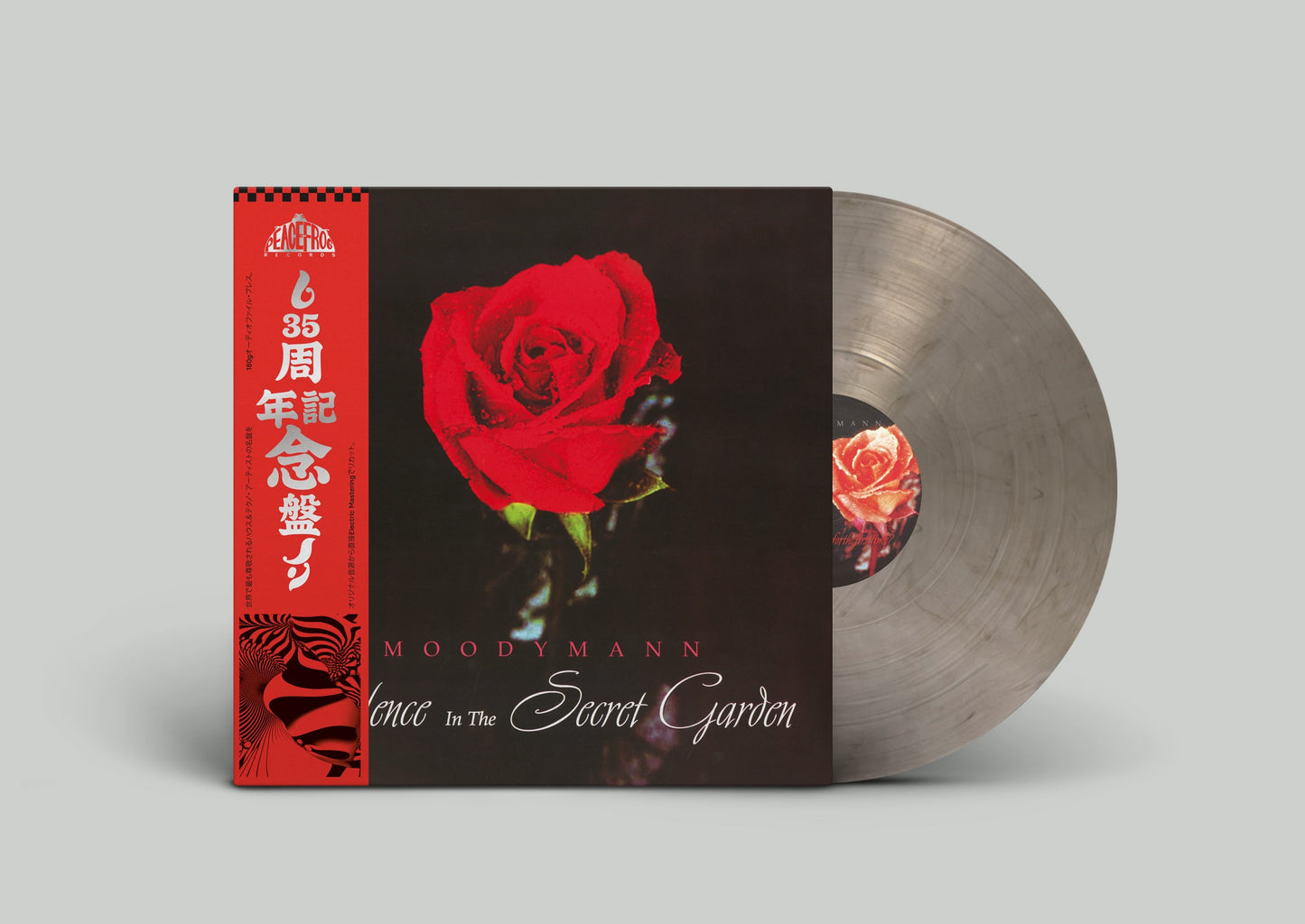 Vinilo color ahumado de Moodymann – Silence In The Secret Garden parcialmente dentro de funda con rosa roja en portada y obi strip japonés, reedición 180 g doble LP de Peacefrog Records.