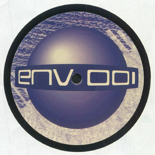 Etiqueta central del lado B del vinilo Morgan Geist – Premise EP (12", SELLO: Environ), arte gráfico con esfera púrpura y código de catálogo ENV 001 en estilo retro futurista.