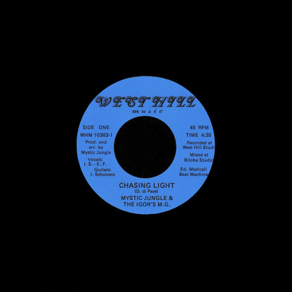 Portada del vinilo 7 pulgadas Mystic Jungle – Chasing Light / Under Pressure, con disco negro y etiqueta azul de West Hill Music.