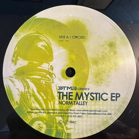Lado A del vinilo Norm Talley – The Mystic EP en TMR Classics, etiqueta verde con tema espacial y pista Circles.