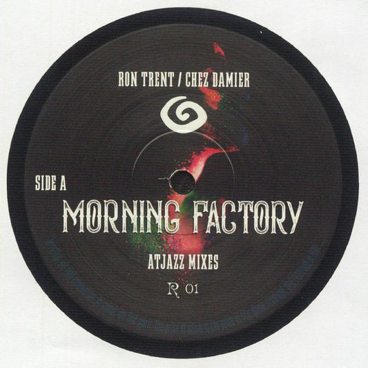 Etiqueta central del vinilo Ron Trent / Chez Damier / Ben Vedren – Morning Factory Remixes [12"], lado A. Muestra el título “Morning Factory” con las mezclas de Atjazz, editado por Balance Recording. Diseño oscuro con toque artístico y catálogo R 01.