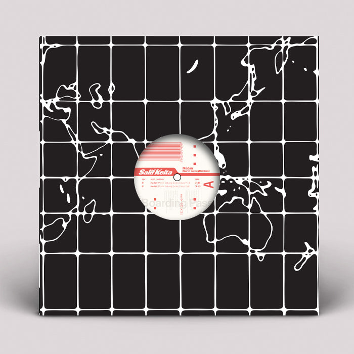 Portada delantera del vinilo con diseño de rejilla mundial y recorte central. Salif Keita – Madan (Martin Solveig Remixes), publicado por South Street International en formato 12", reedición.