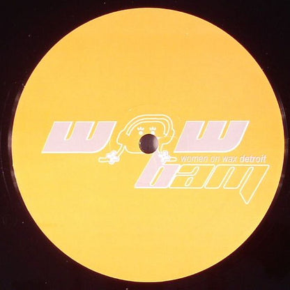 Etiqueta central lado B del vinilo Seeds – Equatorial en 12" de Women On Wax Recordings, diseño amarillo con logo WOW Bam en gran formato y estilo minimal.