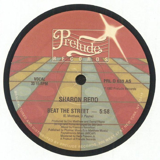 Etiqueta central del vinilo Sharon Redd – Beat The Street (Prelude Records, 12", reedición). Lado A vocal de 5:58 con créditos visibles a Eric Matthew y Darryl Payne, mezcla de François Kevorkian y arte clásico del sello Prelude.