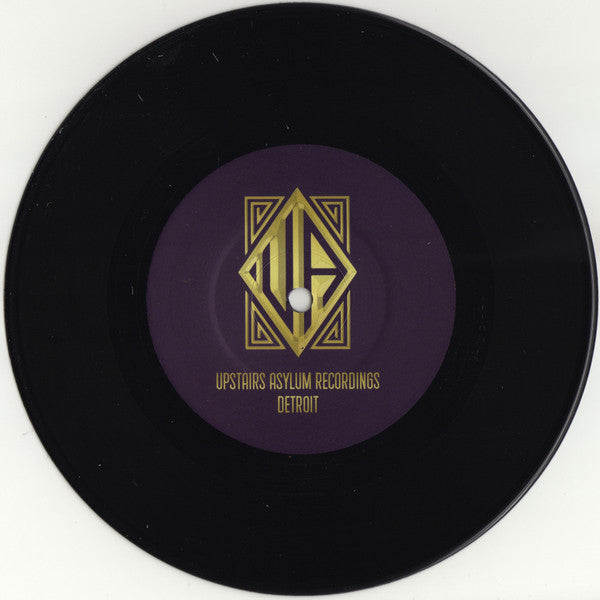 Lado B del vinilo 7" Steve Crawford – Arctic Vibration con logo de Upstairs Asylum Recordings en etiqueta central púrpura.