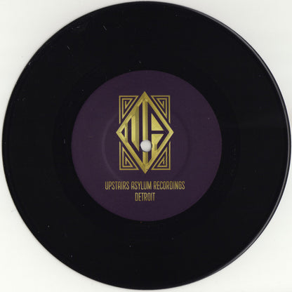 Lado B del vinilo 7" Steve Crawford – Arctic Vibration con logo de Upstairs Asylum Recordings en etiqueta central púrpura.