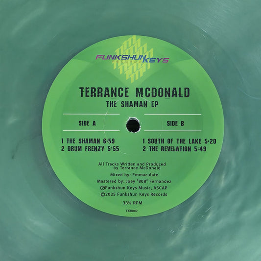 Lado A del vinilo Terrance McDonald – The Shaman EP en turquesa marmoleado con tracks, créditos y catálogo FKR002 visibles.