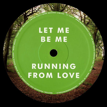 Cara C del vinilo The Other People Place – Lifestyles Of The Laptop Café con la etiqueta verde y las canciones “Let Me Be Me” y “Running From Love”.