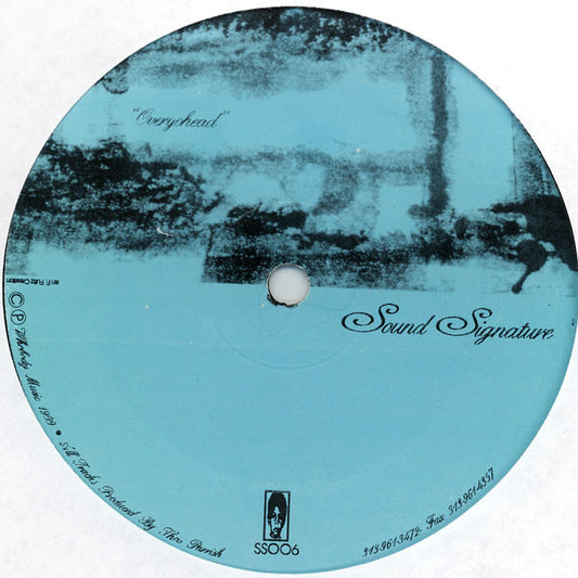 Lado A del vinilo Theo Parrish – Overyohead, lanzado por el sello Sound Signature. Texto impreso: “Overyohead”, SS006.