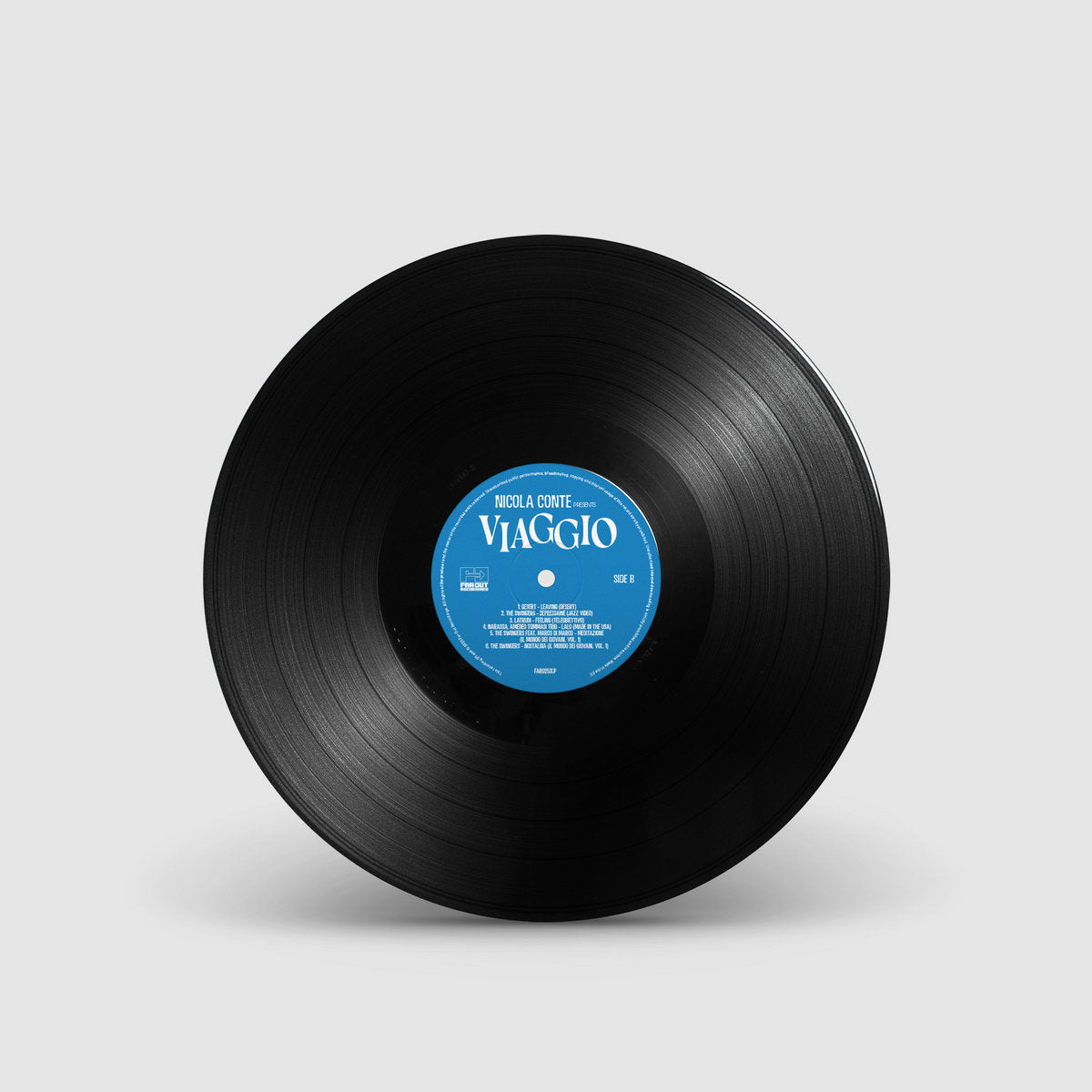 Lado B del vinilo Varios Artistas – Nicola Conte Presents Viaggio LP compilación Far Out Recordings, etiqueta azul con tracks y detalles impresos del sello.