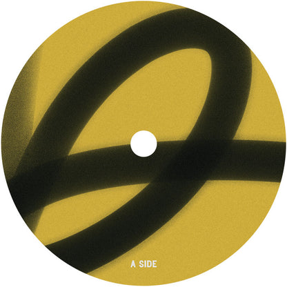 Etiqueta central lado A del vinilo Varios Artistas – Blueprint en 12" de MUJA, con diseño circular negro sobre fondo amarillo.