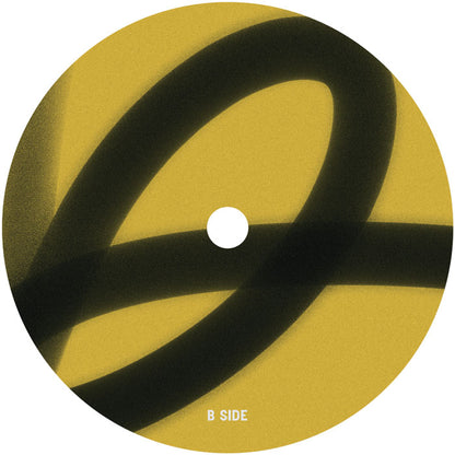 Etiqueta central lado B del vinilo Varios Artistas – Blueprint en 12" de MUJA, con diseño gráfico minimalista negro sobre amarillo.