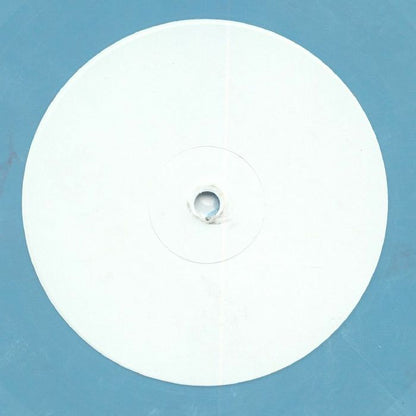 Lado B del vinilo Varios Artistas – Collector’s Item #1, etiqueta central blanca sin impresión visible sobre vinilo turquesa de 12".