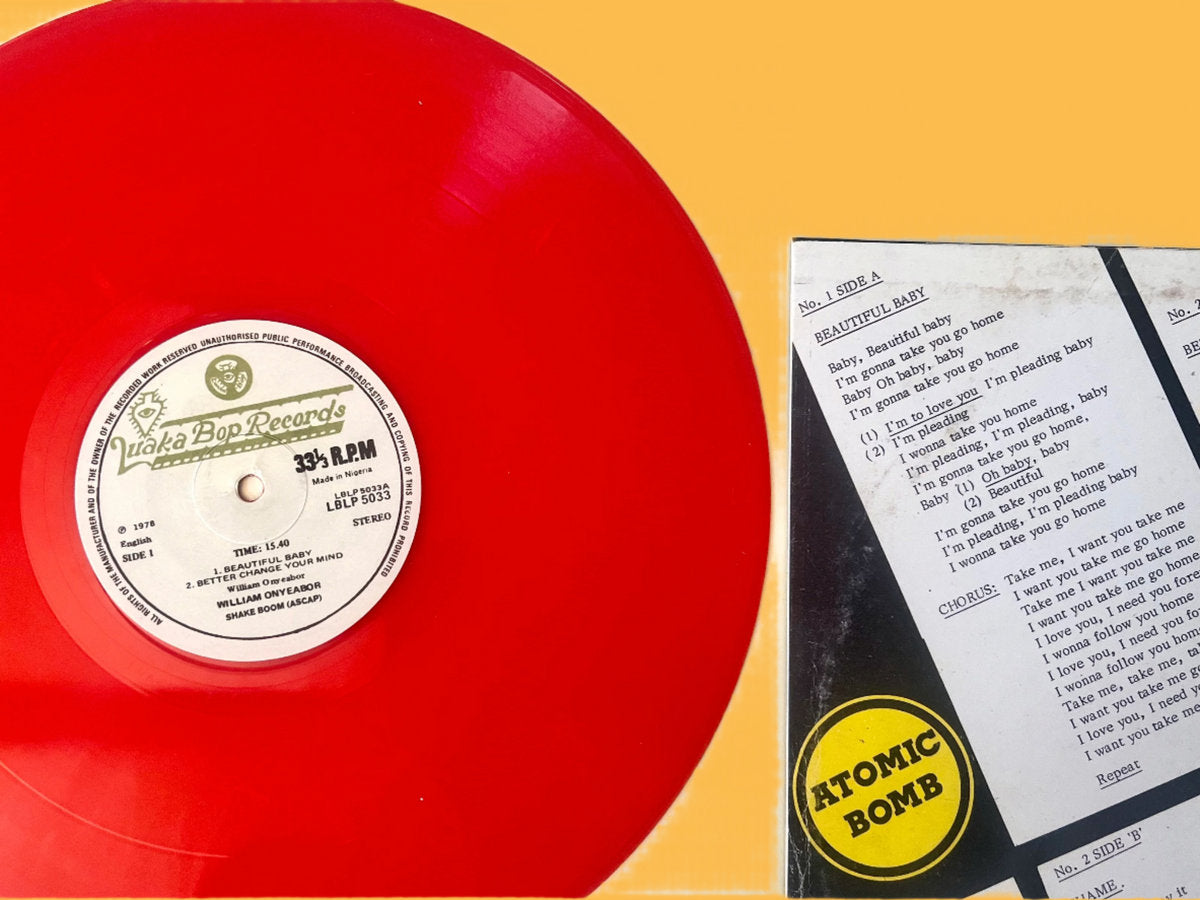 Lado A del vinilo rojo fission con etiqueta Luaka Bop visible. Incluye "Beautiful Baby" y "Better Change Your Mind".